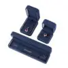 Navy blue velvet earring boxes with custom foam inserts and gold-embossed logo – premium jewelry packaging